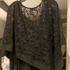 Size 16 Black jumpsuit with built in lace coverup. This looks so nice on!